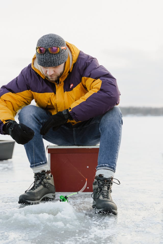 ice fisherman caught a fish